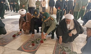 غبارروبی و عطرافشانی گلزار شهدای قوچان